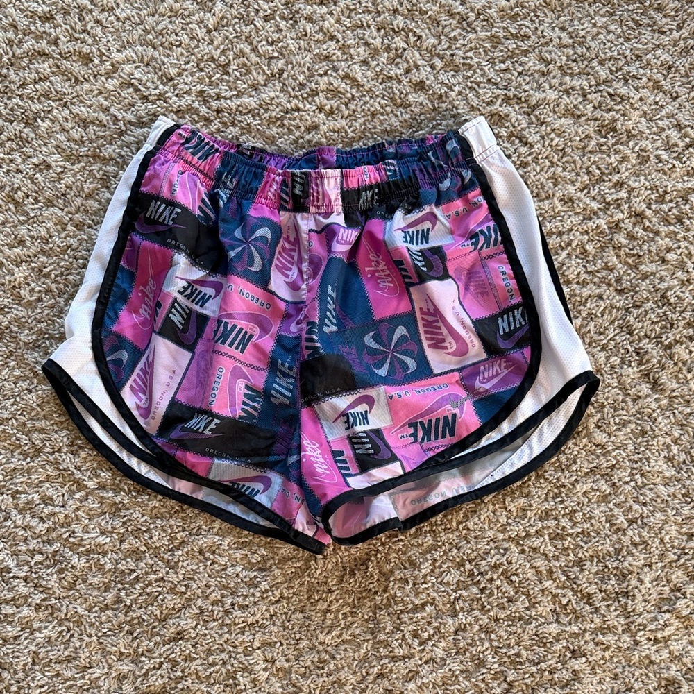 Nike Women’s Pink, Black and Blue  Graphic Athletic Shorts. Size small.